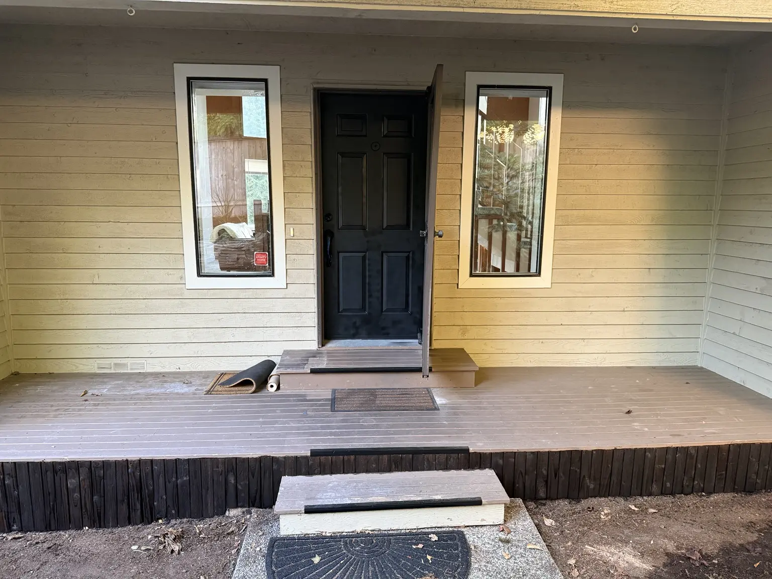 Entry midway through the color update with lighter walls and unfinished window trim